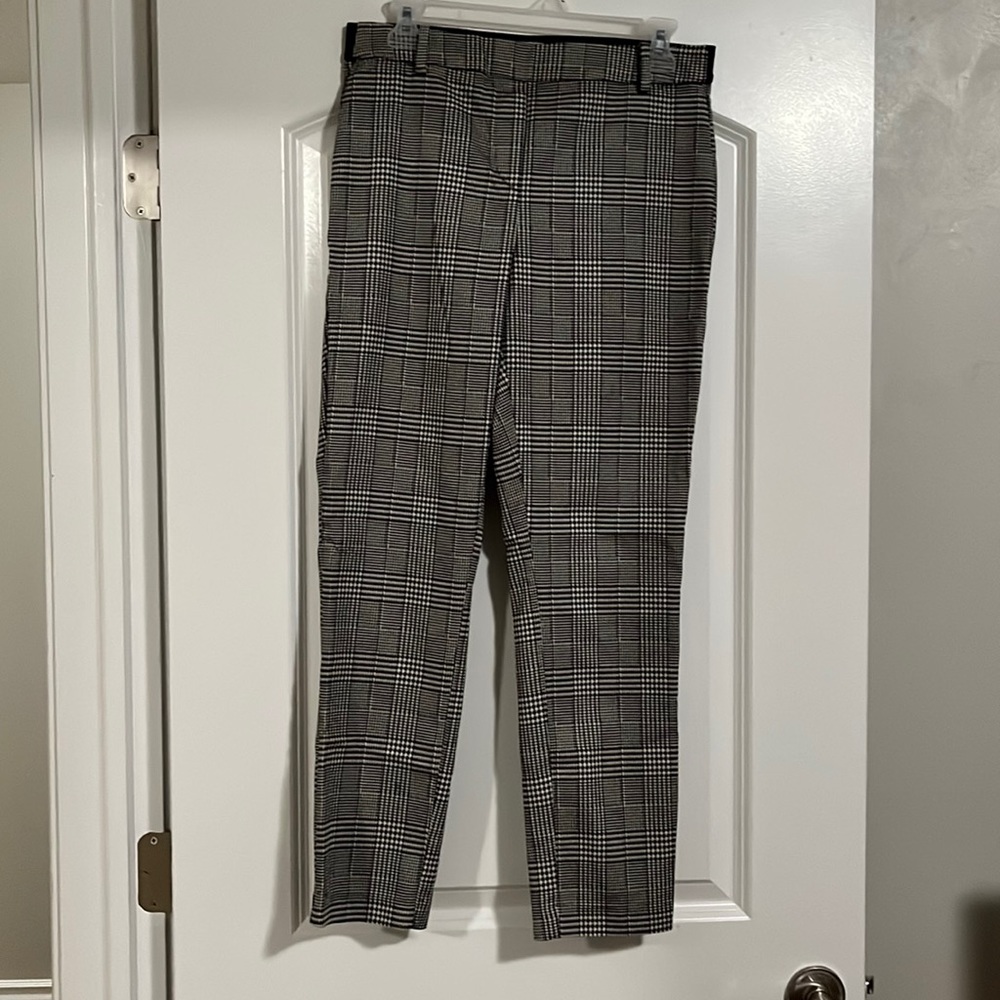 Black and white ankle business casual pants elastic waist size 8. Lightly worn.